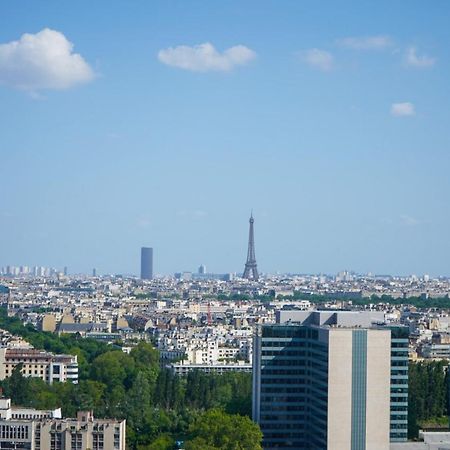 Vue panoramique sur Paris : Sublime appartement au centre de Courbevoie Extérieur photo
