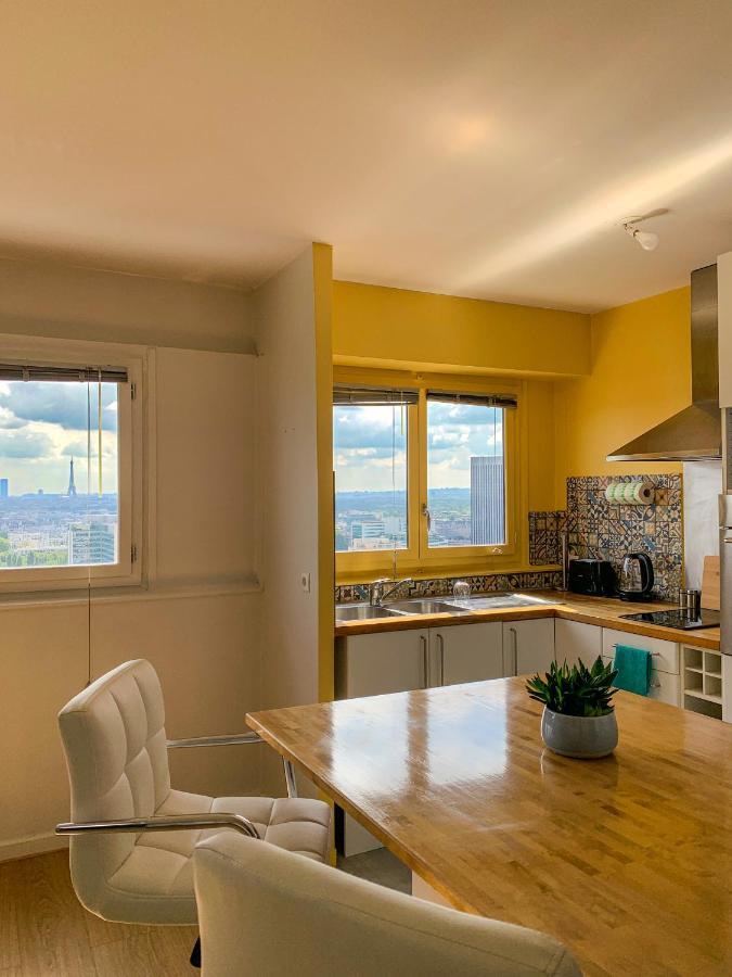 Vue panoramique sur Paris : Sublime appartement au centre de Courbevoie Extérieur photo