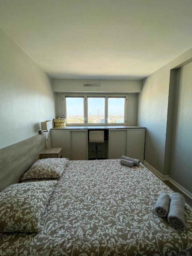 Vue panoramique sur Paris : Sublime appartement au centre de Courbevoie Extérieur photo