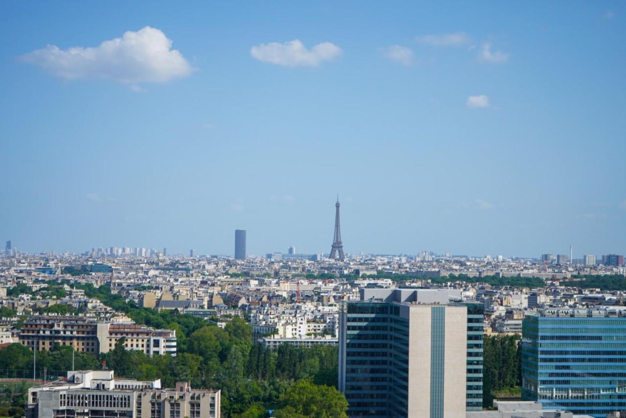 Vue panoramique sur Paris : Sublime appartement au centre de Courbevoie Extérieur photo